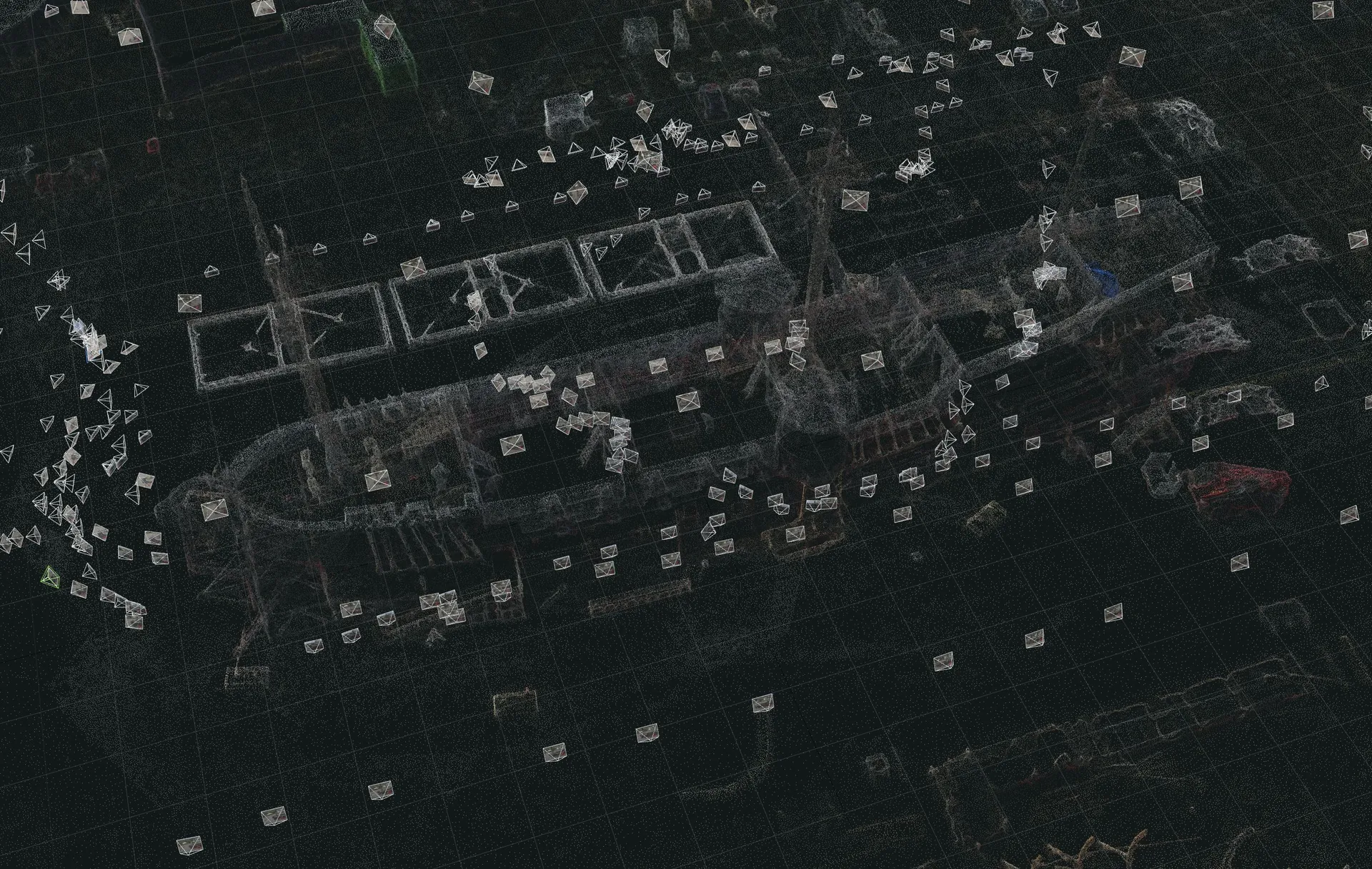 Point cloud of a ship from above ringed with camera markers
