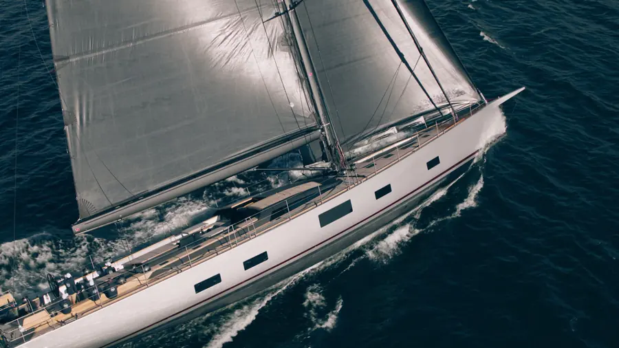 Kalantis from directly above, sails full, crew on deck